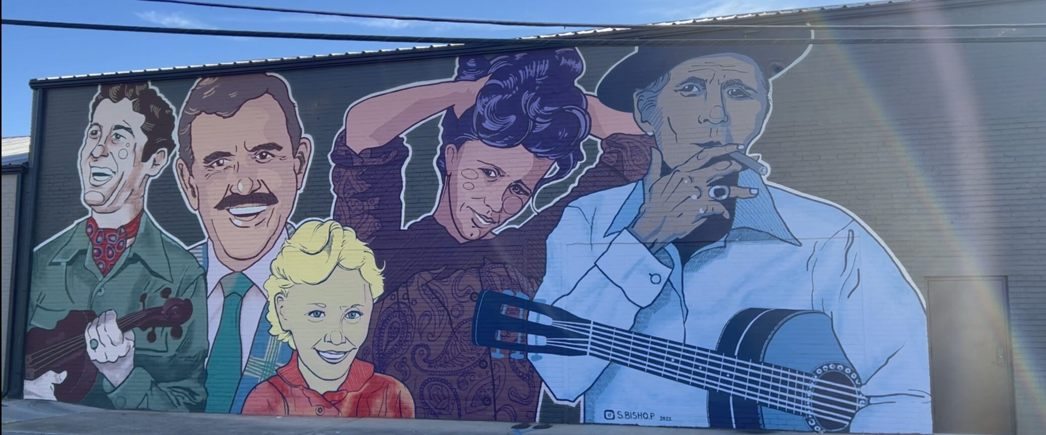 Country music stars in mural at The Pines Downtown in Sevierville, TN